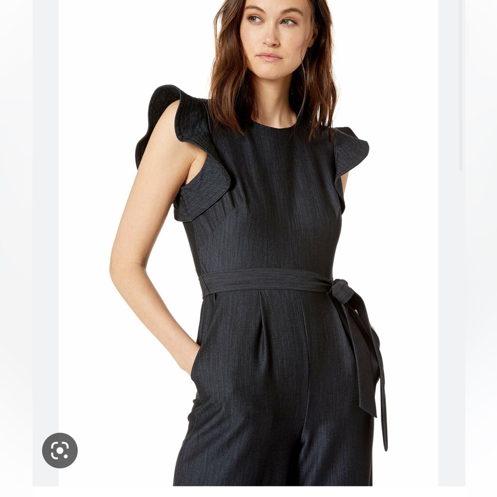 Calvin Klein belted BLU jumpsuit size 2. Flutter sleeves zipper up the back NWT